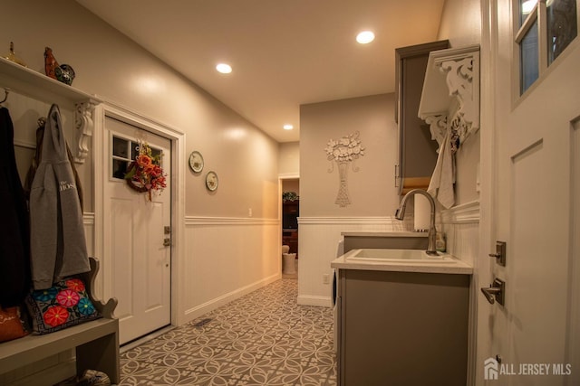 20 Wedgewood Ct, East Brunswick, NJ 08816 - interior space featuring a sink, wainscoting, light floors, and recessed lighting