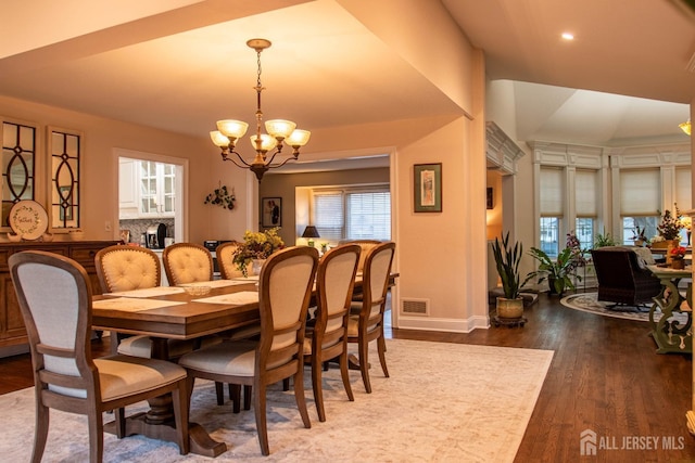 20 Wedgewood Ct, East Brunswick, NJ 08816 - dining room with a chandelier, baseboards, visible vents, and wood finished floors