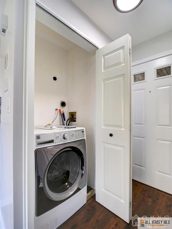 105 Longfield Ct Unit 105, East Brunswick, NJ 08816 - laundry room featuring washer / dryer and dark wood finished floors