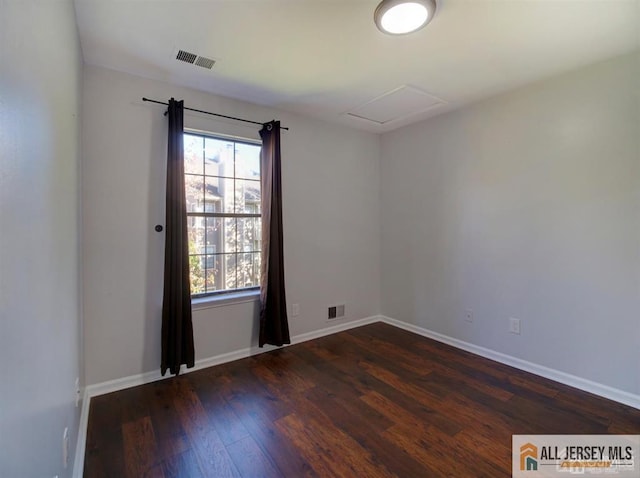 105 Longfield Ct Unit 105, East Brunswick, NJ 08816 - unfurnished room with hardwood / wood-style floors, healthy amount of natural light, and attic access