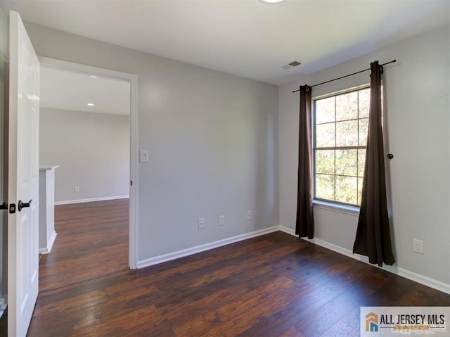 105 Longfield Ct Unit 105, East Brunswick, NJ 08816 - spare room with dark wood-type flooring and baseboards