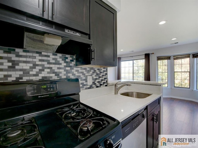 105 Longfield Ct Unit 105, East Brunswick, NJ 08816 - kitchen featuring black appliances, backsplash, dark wood-style floors, and recessed lighting