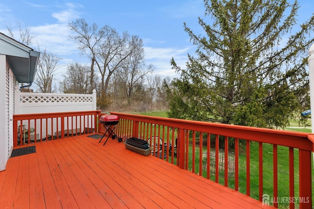 76 Lynnette Ct, South Brunswick, NJ 08824 - wooden terrace featuring grilling area and a lawn