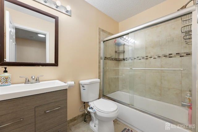 76 Lynnette Ct, South Brunswick, NJ 08824 - full bath with vanity, enclosed tub / shower combo, a textured ceiling, and tile patterned flooring