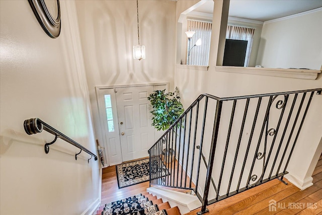 164 Mahar Ave, South Plainfield, NJ 07080 - entryway with hardwood / wood-style floors, stairway, and ornamental molding