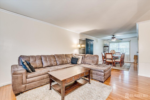 164 Mahar Ave, South Plainfield, NJ 07080 - living room with light wood-style flooring, ornamental molding, and ceiling fan