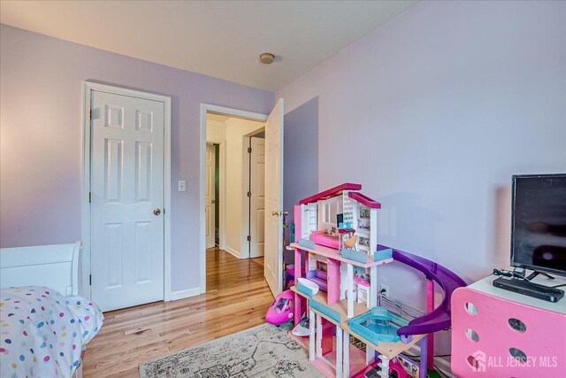 164 Mahar Ave, South Plainfield, NJ 07080 - bedroom with wood finished floors and baseboards