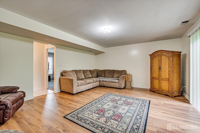 164 Mahar Ave, South Plainfield, NJ 07080 - living room with light wood finished floors and baseboards