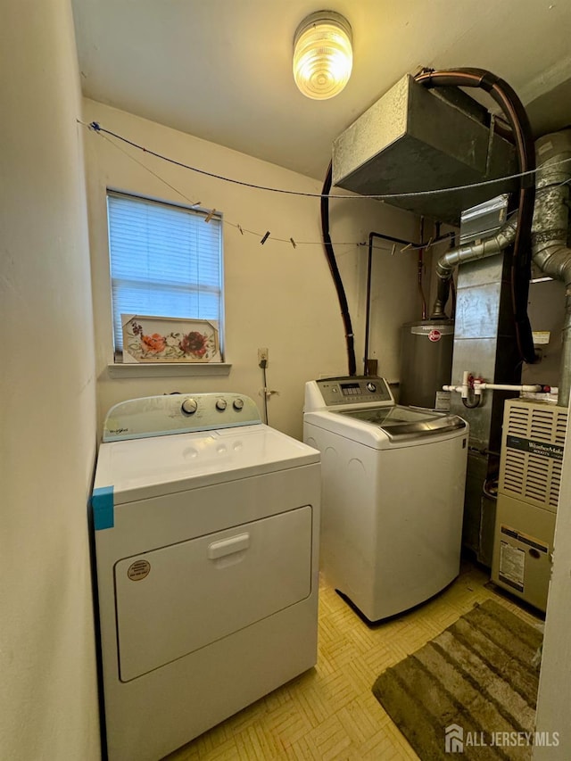 12 Yates Ave, South River, NJ 08882 - laundry area featuring washing machine and dryer and water heater