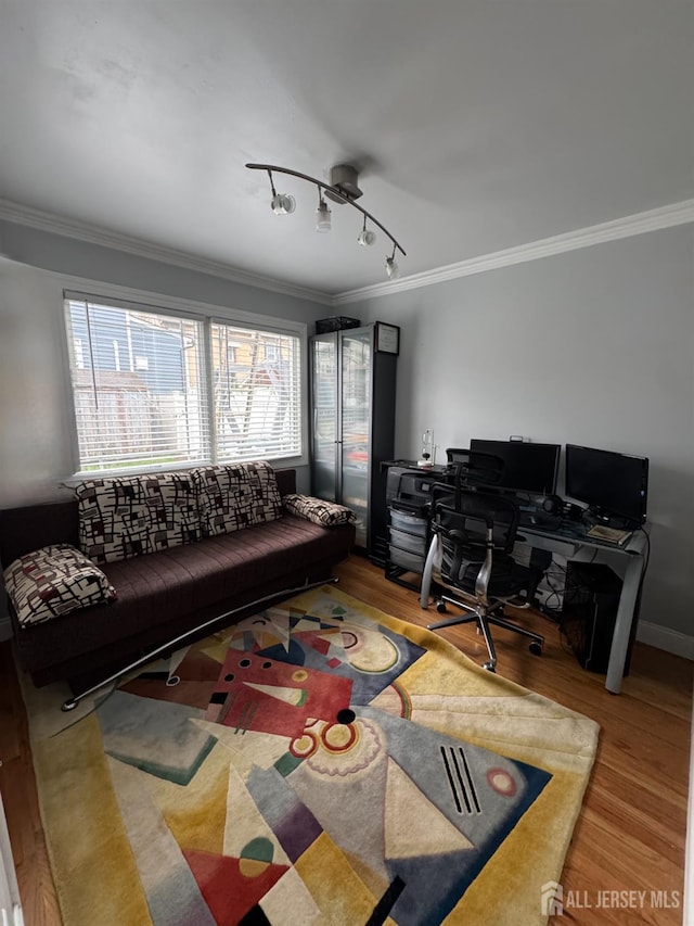 12 Yates Ave, South River, NJ 08882 - living area with ornamental molding, wood finished floors, a desk, and rail lighting