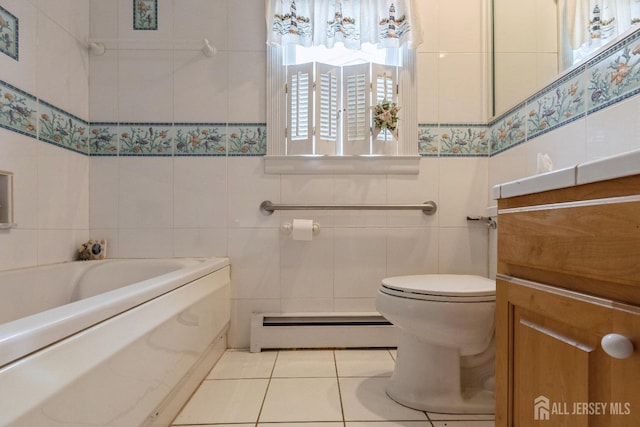 full bathroom featuring toilet, a baseboard radiator, a bathtub, and tile walls