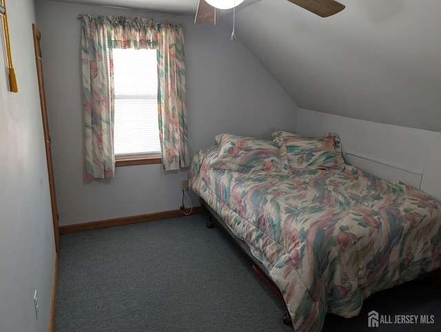 33 Cypress St, Carteret, NJ 07008 - carpeted bedroom with vaulted ceiling, multiple windows, a ceiling fan, and baseboards
