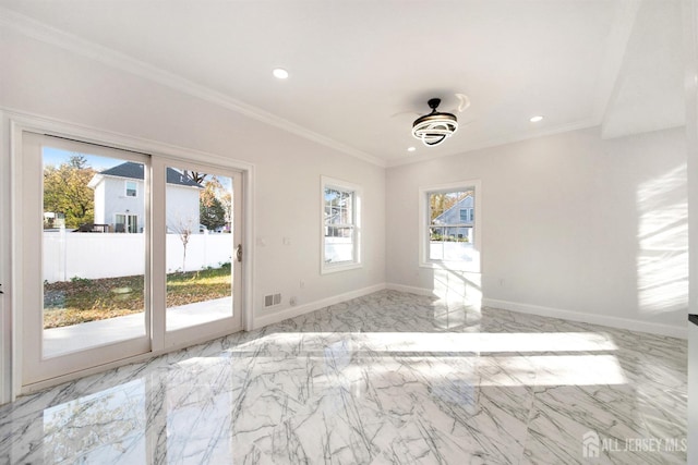 interior space with marble finish floor, baseboards, crown molding, and recessed lighting