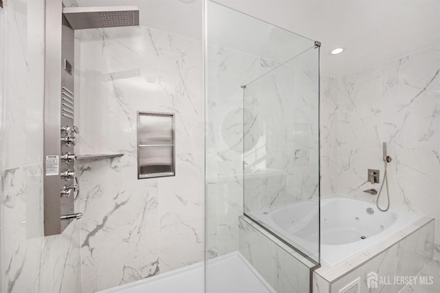 full bath featuring a combined bath / shower with marble appearance