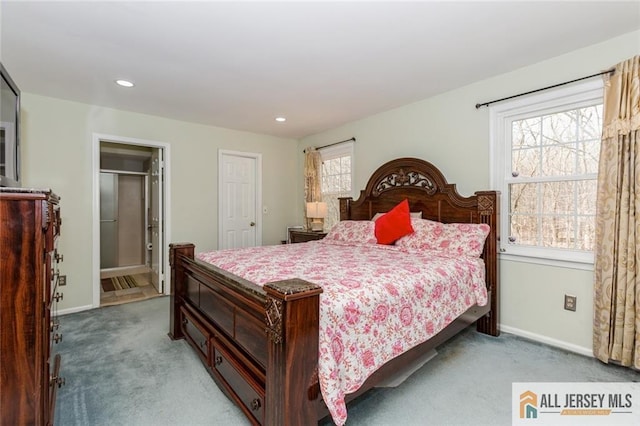 bedroom with light colored carpet, recessed lighting, and baseboards