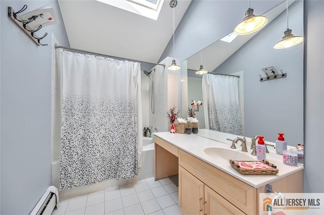 full bath with vaulted ceiling with skylight, shower / bath combo, a baseboard radiator, tile patterned floors, and vanity