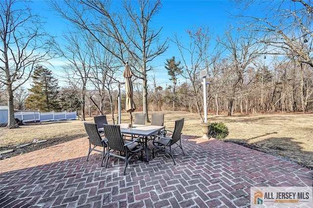 view of patio / terrace with fence and outdoor dining space