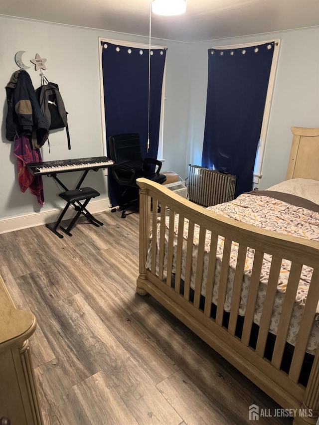 3350 E Washington Rd, Parlin, NJ 08859 - bedroom with wood finished floors and baseboards