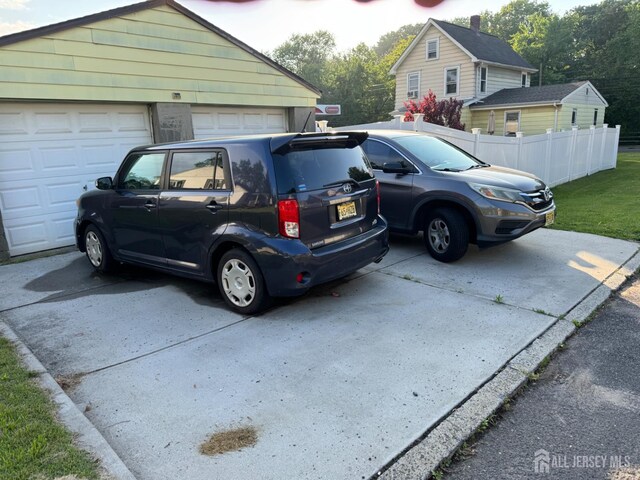 3350 E Washington Rd, Parlin, NJ 08859 - garage with concrete driveway