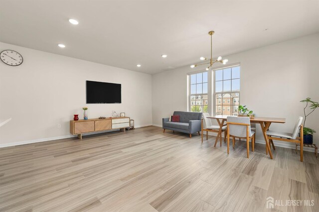 4 Arnold Dr Unit 5302, Wood-Ridge, NJ 07075 - living room with light wood finished floors, recessed lighting, and a chandelier
