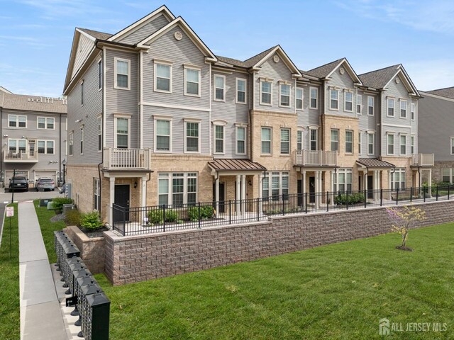 4 Arnold Dr Unit 5302, Wood-Ridge, NJ 07075 - view of property with brick siding and a residential view