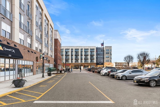 4 Arnold Dr Unit 5302, Wood-Ridge, NJ 07075 - view of building exterior featuring uncovered parking