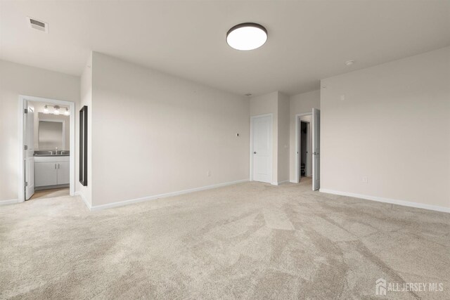4 Arnold Dr Unit 5302, Wood-Ridge, NJ 07075 - spare room featuring light colored carpet and baseboards