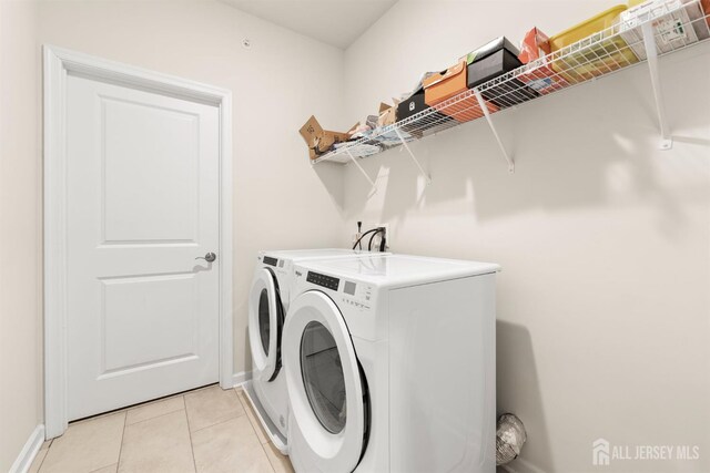 4 Arnold Dr Unit 5302, Wood-Ridge, NJ 07075 - laundry room with independent washer and dryer and light tile patterned floors