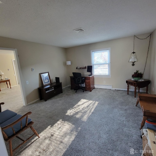 office area with carpet floors, visible vents, a baseboard heating unit, a textured ceiling, and baseboards