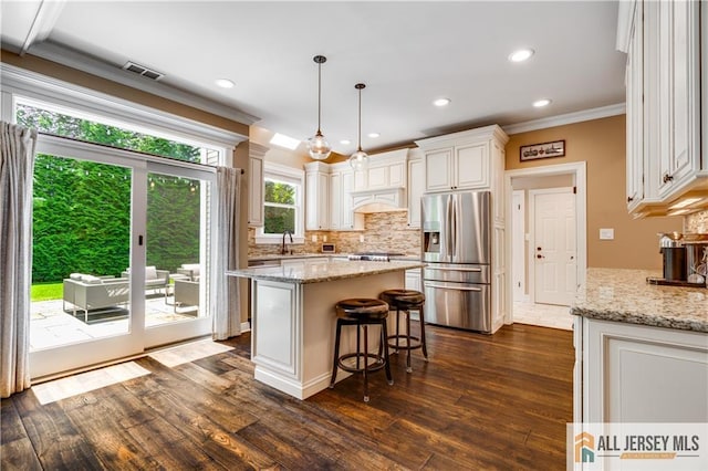12 Wharton Ct, South Brunswick, NJ 08824 - kitchen featuring stainless steel appliances, tasteful backsplash, crown molding, dark wood-style floors, and recessed lighting