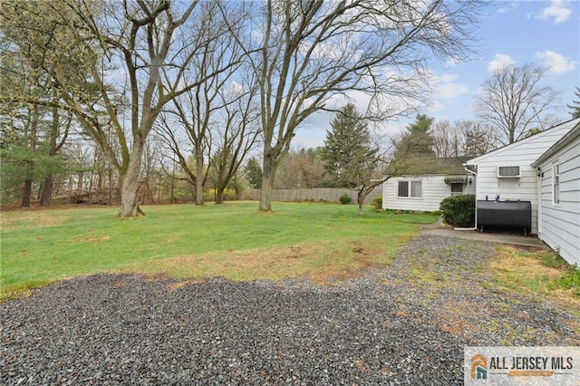 377 Ridge Rd, South Brunswick, NJ 08810 - view of yard with oil tank and a wall mounted air conditioner