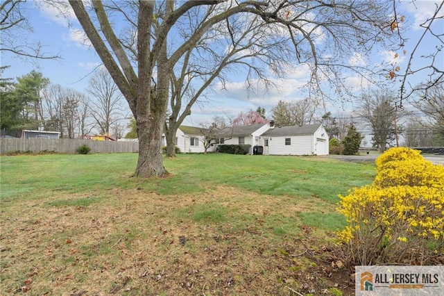 377 Ridge Rd, South Brunswick, NJ 08810 - view of yard featuring a garage