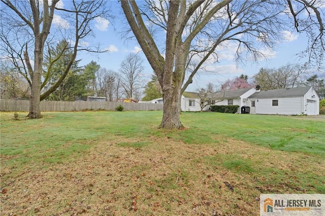 377 Ridge Rd, South Brunswick, NJ 08810 - view of yard featuring a garage