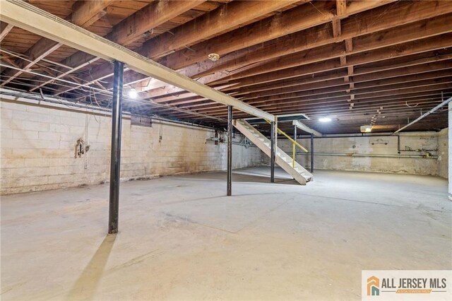 377 Ridge Rd, South Brunswick, NJ 08810 - unfinished basement featuring stairway