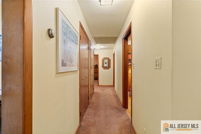 377 Ridge Rd, South Brunswick, NJ 08810 - hallway featuring light carpet