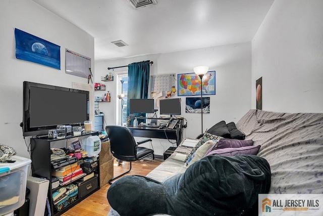 home office featuring wood finished floors