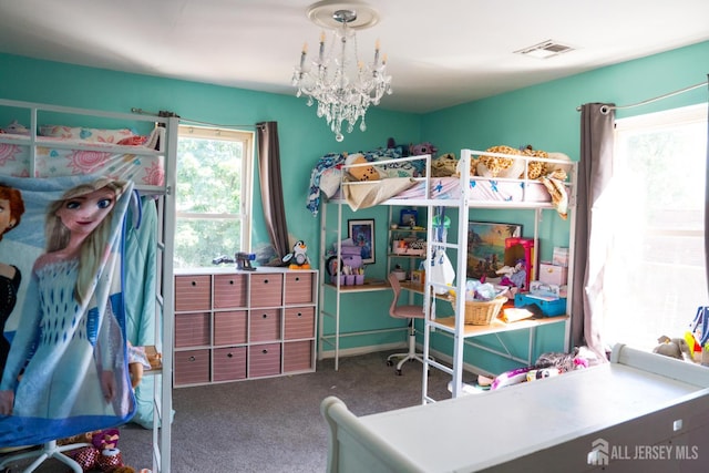 50 Heald St, Carteret, NJ 07008 - carpeted bedroom featuring a chandelier