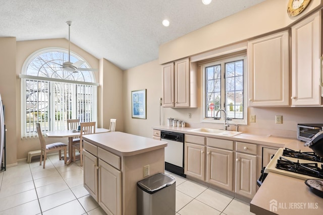 kitchen featuring white appliances, a kitchen island, a sink, vaulted ceiling, and light countertops