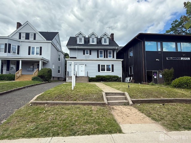201 Livingston Ave, New Brunswick, NJ 07002 - view of front facade with a front yard