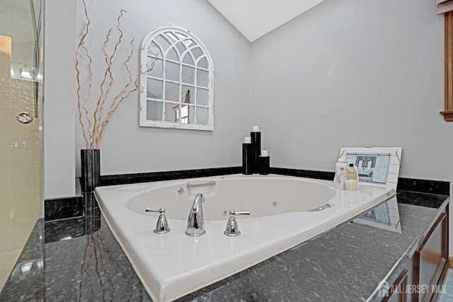 bathroom featuring a whirlpool tub