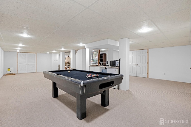 game room with carpet floors, a paneled ceiling, and billiards