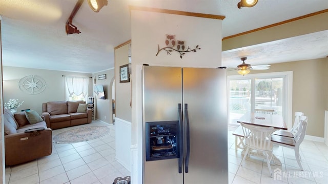 68 Applegate Ave, Monroe, NJ 08831 - kitchen featuring light tile patterned floors, a ceiling fan, stainless steel refrigerator with ice dispenser, crown molding, and baseboards