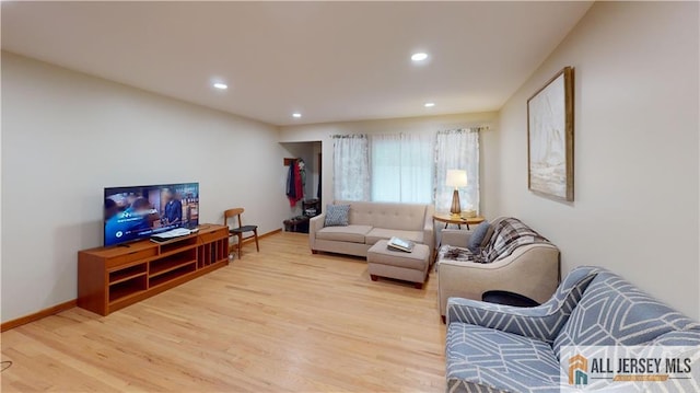 398 Waltham Ave, Metuchen, NJ 08840 - living room with light wood-style flooring and recessed lighting
