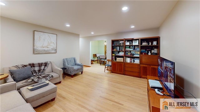 398 Waltham Ave, Metuchen, NJ 08840 - living room with light wood-type flooring and recessed lighting