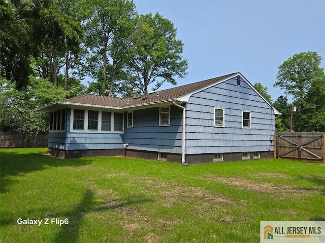 398 Waltham Ave, Metuchen, NJ 08840 - rear view of property with a chimney