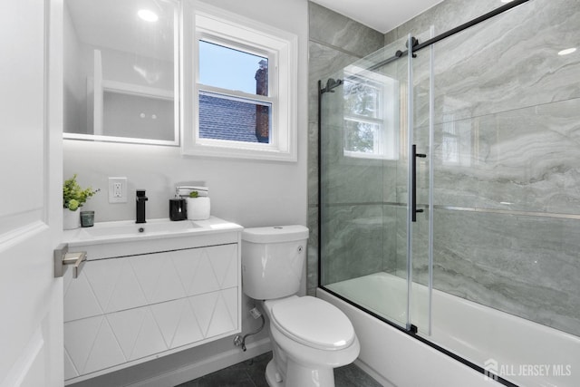 39 S Pierson Rd, Maplewood, NJ 07040 - bathroom with toilet, vanity, enclosed tub / shower combo, and tile patterned flooring