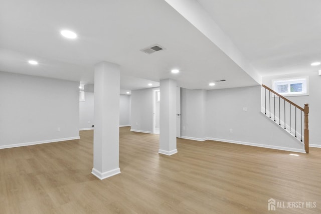 39 S Pierson Rd, Maplewood, NJ 07040 - basement with light wood-type flooring, stairway, baseboards, and recessed lighting