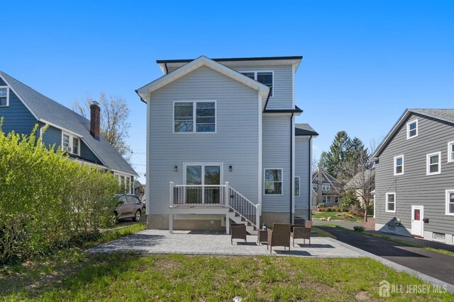 39 S Pierson Rd, Maplewood, NJ 07040 - back of house with a patio area