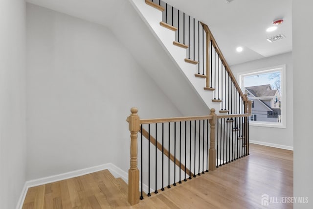 39 S Pierson Rd, Maplewood, NJ 07040 - stairway with wood finished floors, baseboards, and recessed lighting