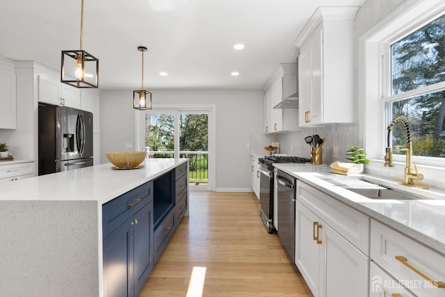 39 S Pierson Rd, Maplewood, NJ 07040 - kitchen with appliances with stainless steel finishes, a sink, blue cabinets, white cabinetry, and recessed lighting